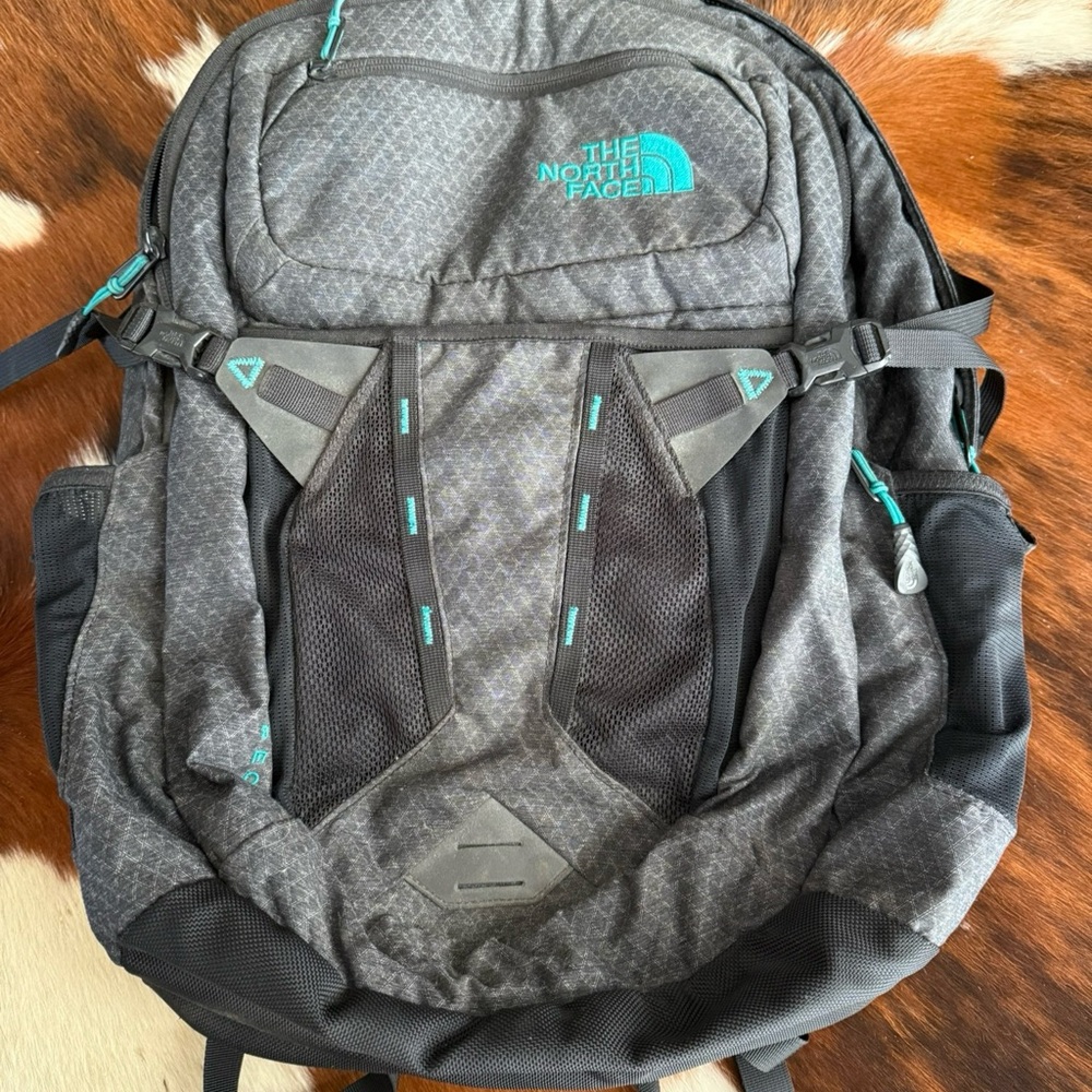 The North Face Charcoal Backpack with Teal Accents